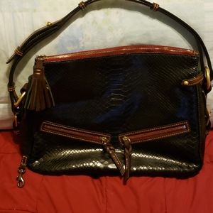 Snake pattern leather Dooney and Bourke handbag.